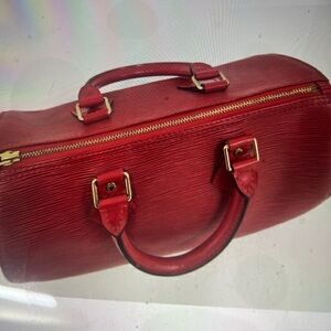 Red Louis Vuitton bag